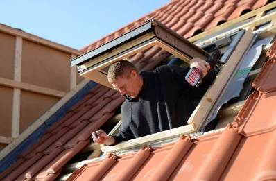 Pose de fenêtres de toit Velux à Serriera
